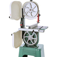 grizzly g0555 classic 14 inch bandsaw doors open so you can see the belt and dust collection.