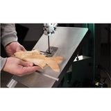 In use image showing a fish shape cut on the G0948 bandsaw.