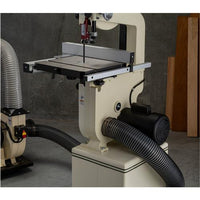 Lifestyle image showing how the shop fox w1706 1 hp 14 bandsaw dust collection attaches to the dust port.