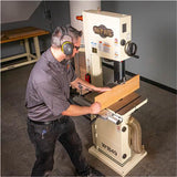 Image showing a man resawing a 6 to 8 inch tall piece of wood with the Shop Fox 14 inch bandsaw